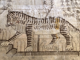 Lovely antique Khotan tiger late 19 c size 95 x 53 inches
Handspun cotton foundations unusually the red outer border seems  to be natural dyes so could be a bit earlier
Could use  ...