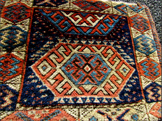 A SANJABI KURD CHUVAL.  The main field design as well as the border design is bigger, bolder, and more distinct then most I have seen. I believe it is from the  ...
