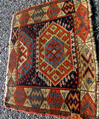 A SANJABI KURD CHUVAL.  The main field design as well as the border design is bigger, bolder, and more distinct then most I have seen. I believe it is from the  ...