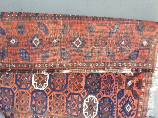 An unusual antique Baluch. All you need is a horse to wrap up the sides and its ready to ride. It measures 36 x 63 inches and is symmetrically knotted. Looking at  ...