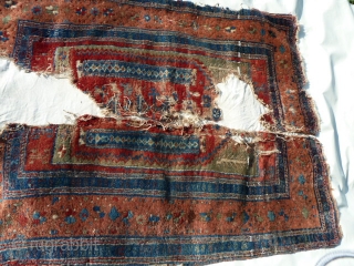 Unusual Anatolian Prayer Rug Fragment- Yuruk or Not Yuruk! That is the question.

   Even though this piece shares similar design elements common to Yuruk type prayer rugs such as the  ...