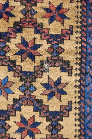 A Camel Hair Arab Baluch Dated about 1890. The date is in the top right-hand corner of the field. Besides all the glorious colors if you enlarge the main picture you will  ...