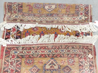 Shasavan or maybe Dagestan/Talish, 19th century. All rising dragon motifs going in one direction on a camel field with pendants at both ends. There is a good amount of aubergine and corroded  ...