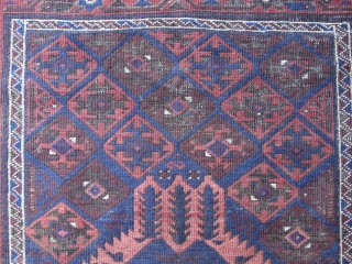 A Rare and Cute Antique Miniature of a Baluch Main Carpet. Measures 40inches x 58inches/101.6 cm x 147.3 cm including Kelim ends. Great border and with great aubergine. It is the smallest  ...