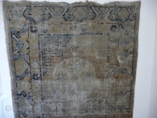   SOLD  Khotan  :beautiful early rug 18/19thc. faded logwood, complete, not rotten, pretty knackered                