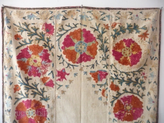 A very pretty small prayer suzani, 4ft5in x 2ft9in.,late 19th cent., embroidery a little rubbed at the top,slight run from the cochineal in a couple of flowers, sound with attractive printed backing,water  ...