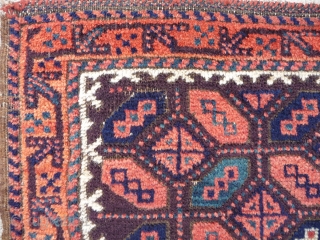  SOLD A pretty 19th cent. Balouch group (Aimac?)bagface with an aubergine ground,turquoise blue and apricot orange colours. Good pile and condition, 2ft1in x 1ft10in    SOLD    