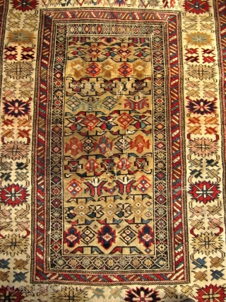  
A  19th/20th Century Yellow Ground Shirvan (Kuba) Rug 
Size 97 x 142 cm

With pastel coloured 'crab border', in fair overall condition with evenly worn pile, foundation warps are visible in  ...