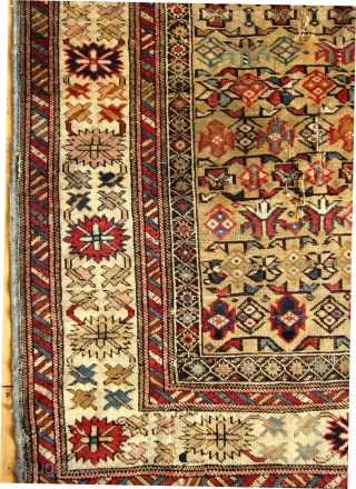  
A  19th/20th Century Yellow Ground Shirvan (Kuba) Rug 
Size 97 x 142 cm

With pastel coloured 'crab border', in fair overall condition with evenly worn pile, foundation warps are visible in  ...