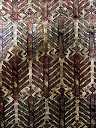 A 19th Century White Ground Baluch/Belouch Prayer Rug 

Size 144 x 93 cm

An unusual design with well drawn Turkman trees in the centre field and botehs in the finials.Pile is low to  ...