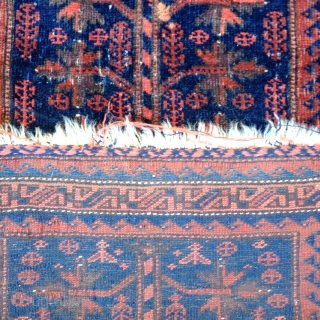 A 19th Century Baluch Balisht
Size 92 x 57 cm

With very silky wool and subdued colours this probably quite an early piece. In overall fair to good condition, with a small repair to  ...