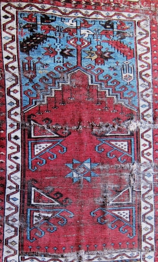 A 19th Century Ladik Prayer Rug 
 Size 184 x 114 cm
A fragmented Ladik prayer rug in poor original condition, losses to selvedges and both ends, with good colours, very soft handle,  ...