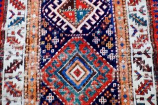  A 19th Century South Caucasian/Northwest Persian Long Rug
 Size 299 x 108 cm

A transitional Caucasian/Northwest Persian long rug with very good colours and with original knotted fringes at one end, original  ...
