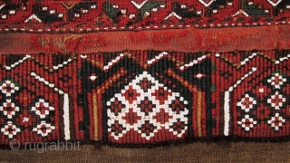 A Turkman brocaded Torba,possibly Yomut, probably late 19th century.
Size; main panel       122 x 48cm
      secondary panel  122 x 14cm
   ...