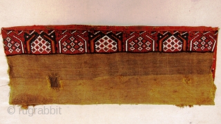 A Turkman brocaded Torba,possibly Yomut, probably late 19th century.
Size; main panel       122 x 48cm
      secondary panel  122 x 14cm
   ...