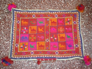 a 19th century banjara textile from india, with lots of figures and with one pillow cower.colors & condition are very good which is very rare to find in this kind of textiles....!
size  ...