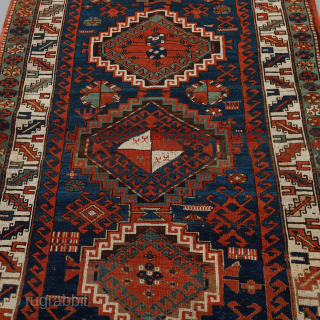 Kazak size 6'8" x 3'8". Very beautiful with great colours. Or like another Kazak would say; "Very nice!".               