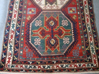 A Lori Pambak Kazak drawn in an exemplary style, with three huge octagons enclosing a large cross design each. – Partially restored sides, both ends repiled. Good overall condition. 

Origin: South West  ...