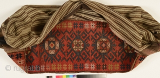 Kyrgyz chavadan (storage bag), Central Asia, Ferghana valley, late 19th century, 97 by 35 cm, with an original homespun back surface, natural dyes.          