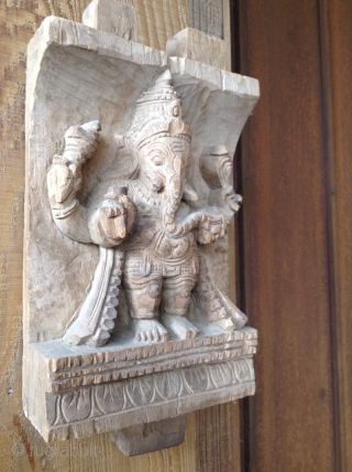 South Indian temple cart fragment, circa late 19th century.
Carved from aromatic wood. 
Ganesha, god of good fortune. 

11 1/2 in. length x 6 in. width x 2 in. depth
    