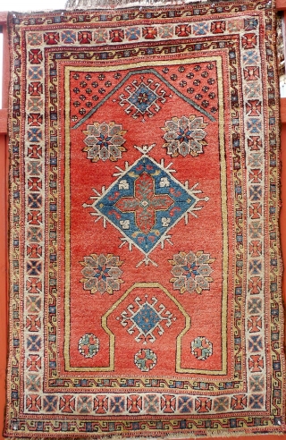 An eighteenth century western Anatolia prayer rug, 42" X 66". A rare so called keyhole or re entry design. Original untouched condition.           