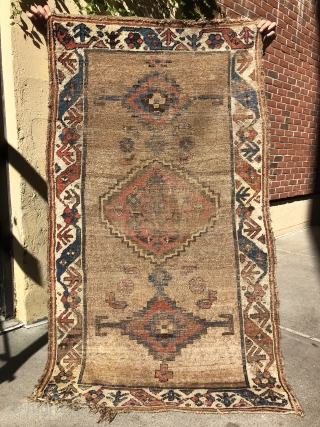 An early N.W. Persian, Kurdish small rug  3'4" X 5'8"  Ca.1800  An amazingly graphic design, beautiful early drawing of all the different designs in the rug. Folks familiar with  ...