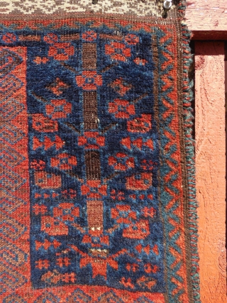 An early Timuri, Baluch prayer rug. Ca. 19th century. A finely woven blue ground prayer of exceedingly rare type.  The wool quality along with very well saturated dyes and elaborately detailed  ...