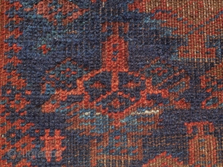An early Timuri, Baluch prayer rug. Ca. 19th century. A finely woven blue ground prayer of exceedingly rare type.  The wool quality along with very well saturated dyes and elaborately detailed  ...