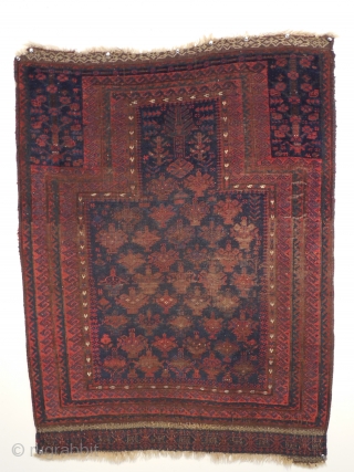 An early Timuri, Baluch prayer rug. Ca. 19th century. A finely woven blue ground prayer of exceedingly rare type.  The wool quality along with very well saturated dyes and elaborately detailed  ...