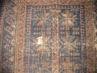 2'10"x 4'3" Belouch "Dokhar Ghazi" prayer rug of 100% wool loomed on wool.  First quarter twentieth century finely knotted showing overall wear and a small hole in the "mihrab" area (see  ...