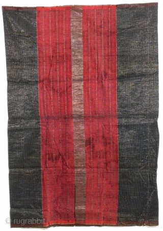 Tubular skirt, ceremonial male sarong, cotton and metal thread, Minangkabau/Sumatra/Indonesia, ca.1950.
This is the third of three  cloths from Sumatra  which I am offering in this series. They are all featuring  ...