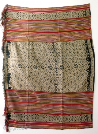 Large  men's wrap cloth, selimut, Insana/West Timor, Indonesia, mid 20th century, Ikat, commercial yarn, handwoven. Three panels, centre covered with very intriguing spiral motif, two colourfull striped panels   enclosing  ...