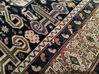 Antique Kuba Perepedil rug. Size 105x165cm. Holes pictured, other than in very good condition. Some synthetic color.                