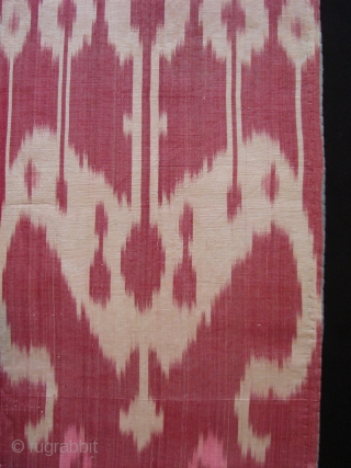 Silk Ikat Fragment.
71cm long and 47 cm wide.
On black backing.                       