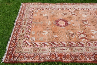 KHOTAN CARPET, ca. 1920, 427 cm X 219 cm, 
in best condition,very soft pile,
colours:black,white,browns,salmon,yellows,grey,orange,purple,
some very small reparations                