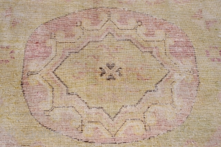 ANTIQUE KHOTAN CARPET:

ca. 1890, 297 cm X 148 cm,
coulours: white, black,browns,yellow,green,purple (some synthetic)
distressed, losses on ends
                 
