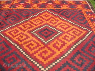 Hazara Kilim from Sar-i-Pul, Afghanistan. Mid-1960's. Wool on Wool. 
Approx. size: Length: 15ft (457.2cm). Width: 9ft 5 in. (287cm).
Hazara Kilims are often wrongly categorized as Almar or Maimana Kilims
(perhaps due to design  ...