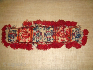 Late 19th to Early 20th Century Decorative Turkmen Camel Neckband Trapping. Red-Orange and Blue Soumakh - weave designs on White Flatweave Base. All Wool.
Dimensions: Length: 84cm  Width: 22cm (Length inclusive of  ...