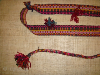 Early 20th Century, Rare Multi-coloured, Shahsavan Malband (Wool). Full piece and in Excellent condition. Strap Length (without the Tasseled Rope fasteners): Approx. 227cm; Strap Width: Approx. 07cm. Tasseled Rope Fasteners' Lengths at  ...