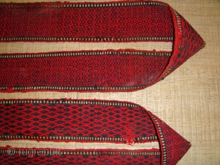 Early 20th Century, Wool, Turkmen Tentband (likely Tekke) with Wooden Wishbone-shaped Fastener. Colour: Deep Red and Black. 
Strap Length (without Rope Fastener): Approx. 997cm ; Strap Width: Approx. 09cm.
Rope Fastener Length (one  ...