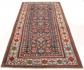 Antique Shirvan 'Bidjov' carpet in a dark blue ground, late 19th century. Size: 150x295cm (4'11"x9'8"). Very good condition, good pile, well preserved.           