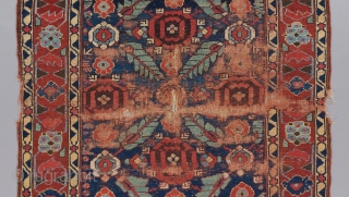 Kurdish serrated leaf lattice rug. A very early one of it's type in a rare size. Relatively restrained yet gorgeous color palette. All original in challenged condition, but the beauty remains !!  ...