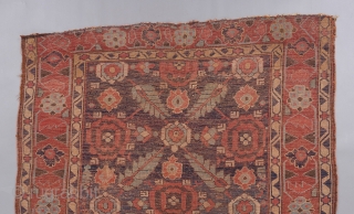 Kurdish serrated leaf lattice rug. A very early one of it's type in a rare size. Relatively restrained yet gorgeous color palette. All original in challenged condition, but the beauty remains !!  ...