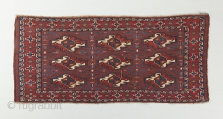 Yomut turbo with very good age. Prob mid 19th. Beautiful aubergine background color and great blues and green-blues. Rare secondary Gols. 3'8" x 1'8".

Visit our website for more rare woven art: www.bbolour.com 