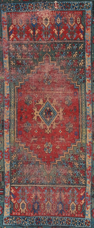 An early Morrocan Rabat rug. Circa 1800. A very rare example of a rare group. While most pieces in this group contain a hodge podge of elements from different traditions, the design  ...