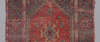 An early Morrocan Rabat rug. Circa 1800. A very rare example of a rare group. While most pieces in this group contain a hodge podge of elements from different traditions, the design  ...