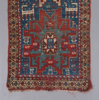 Lovely little caucasian rug. Red and brown wefting. 4'10" x 2'4".                      