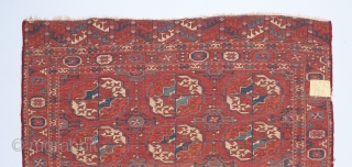 An early Tekke wedding? rug with great color and a fine weave. Beautiful spacing in the field design and a bevy of interesting devices in the border. Missing a bit on each  ...