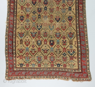 An early 19th century Caucasian rug. Elegantly executed field design with a gorgeous color palette. Nice pile at the bottom and heavily worn at the top as can be seen. A couple  ...