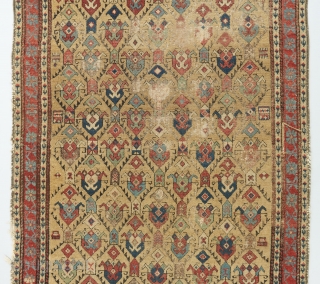 An early 19th century Caucasian rug. Elegantly executed field design with a gorgeous color palette. Nice pile at the bottom and heavily worn at the top as can be seen. A couple  ...